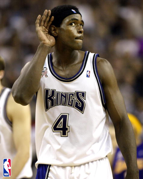 PLEASE NOTE THIS IMAGE IS FOR USE VIA THE CONSUMER POD SITE ONLY. SACRAMENTO, CA - MAY 20: Chris Webber #4 of the Sacramento Kings holds his hand to his ear listening to the crowd while playing against the Los Angeles Lakers during game 2 of the NBA Western Conference Finals at Arco Arena in Sacramento, California on May 15, 2002. NOTE TO USER: User expressly acknowledges and agrees that, by downloading and/or using this Photograph, User is consenting to the terms and conditions of the Getty Images License Agreement. Mandatory copyright notice: Copyright 2002 NBAE (Photo by Jed Jacobsohn/Getty Images)